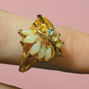Elegant Gold and White Gemstone Ring